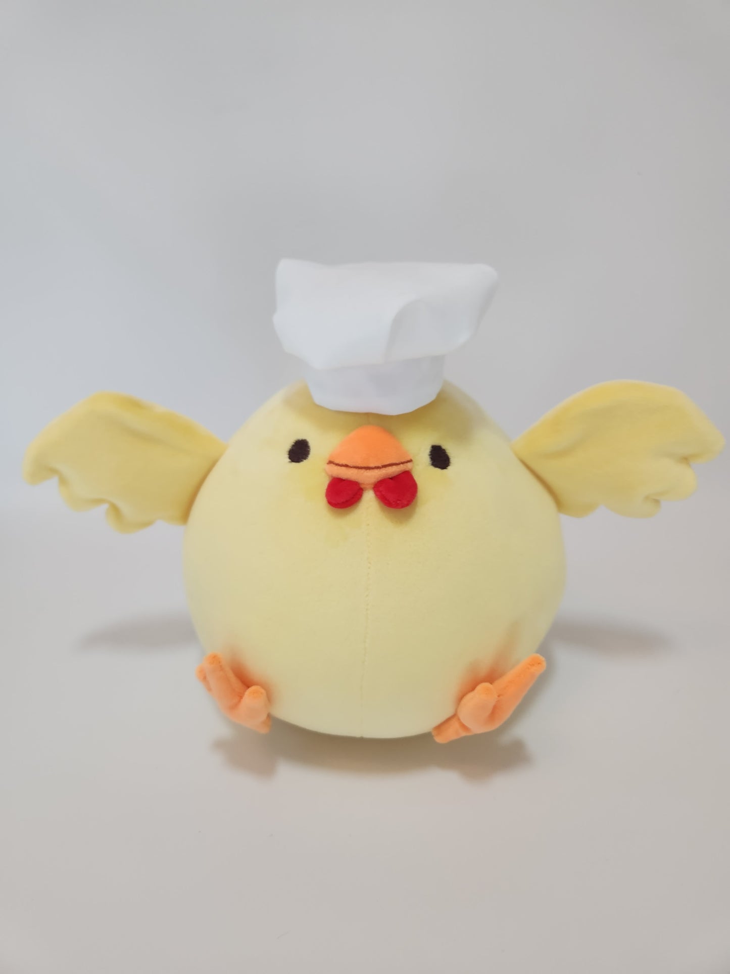 Yellow chonky chicken with hats (mochi)