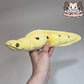 Banana eel plush (mochi, embroidered eyes)