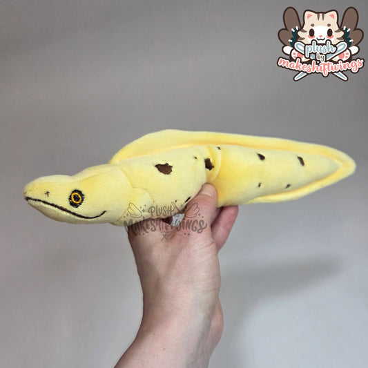 Banana eel plush (mochi, embroidered eyes)