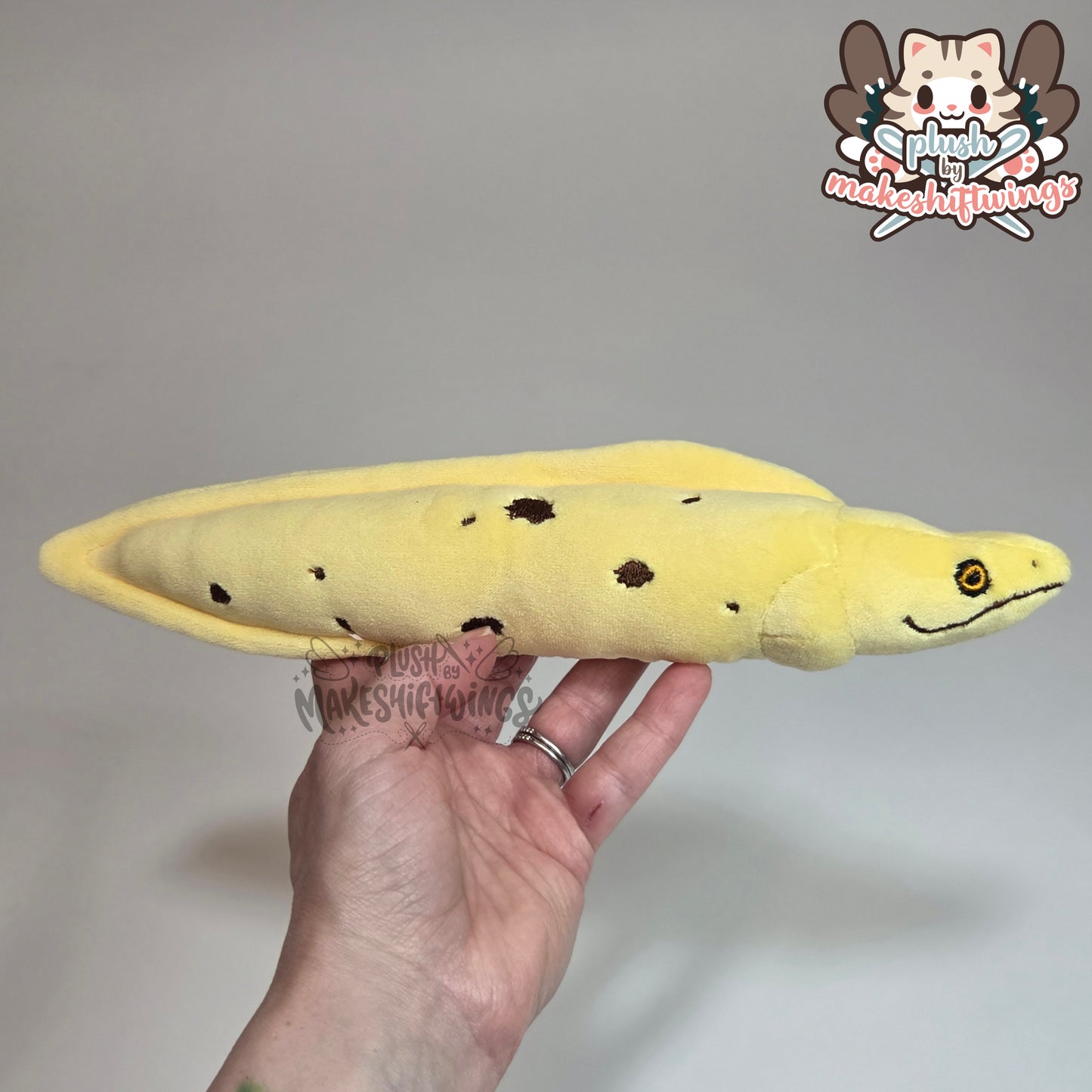 Banana eel plush (mochi, embroidered eyes)
