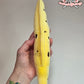 Banana eel plush (mochi, embroidered eyes)