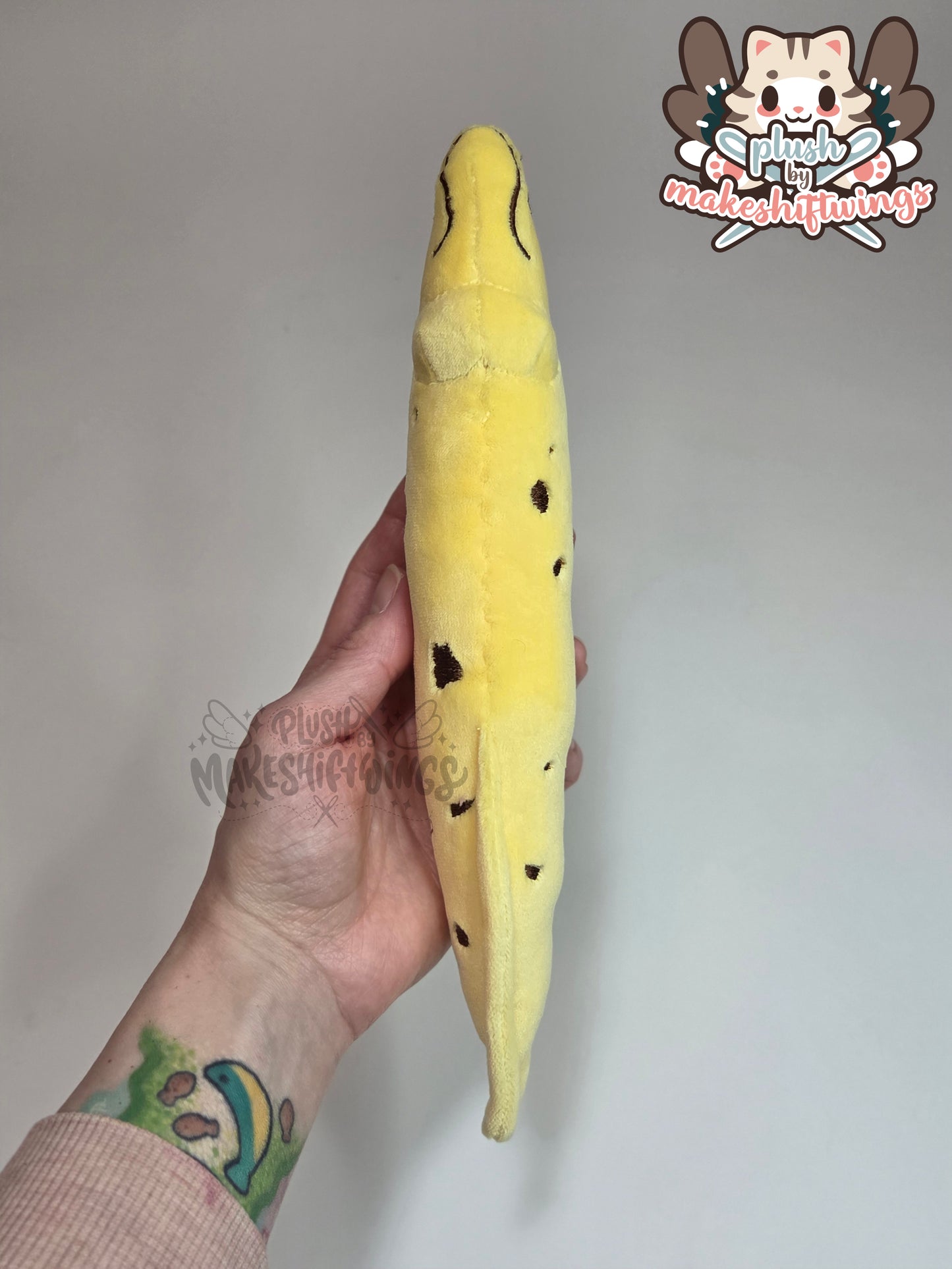 Banana eel plush (mochi, embroidered eyes)