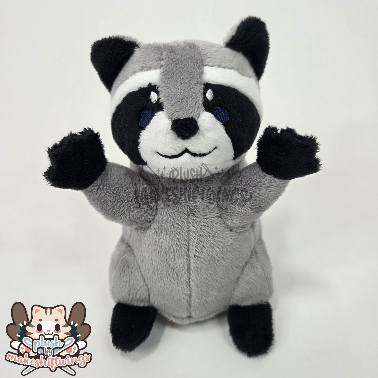 Raccoon in a chip bag (embroidered eyes)