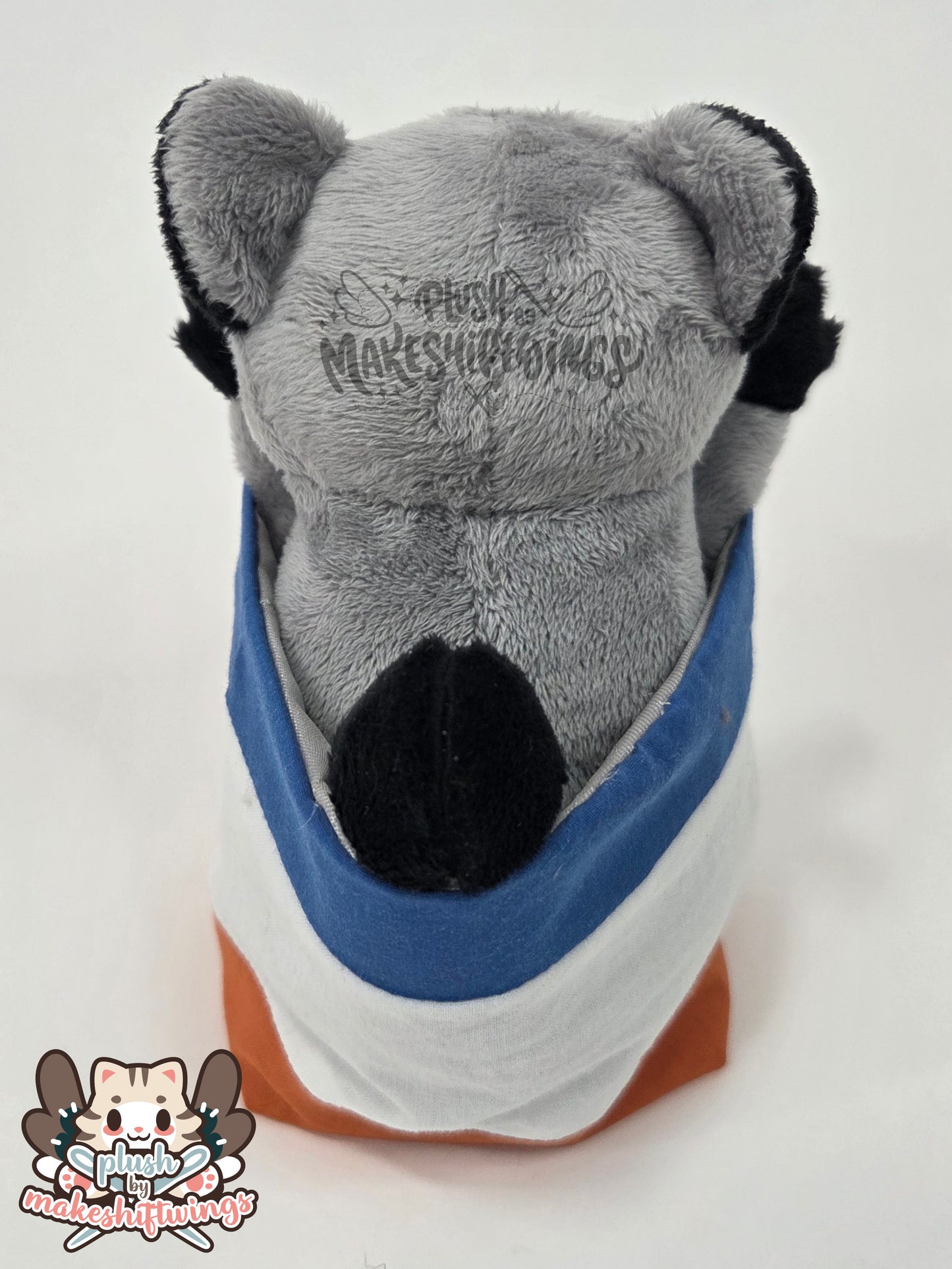Raccoon in a chip bag (embroidered eyes)