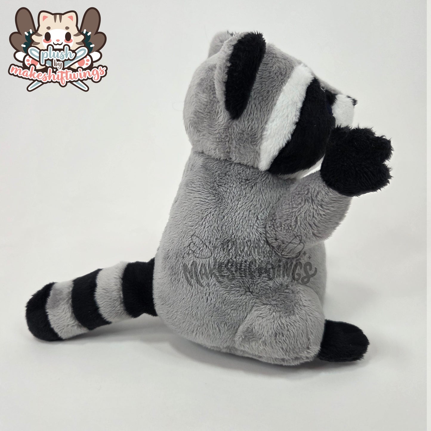 Raccoon in a chip bag (embroidered eyes)