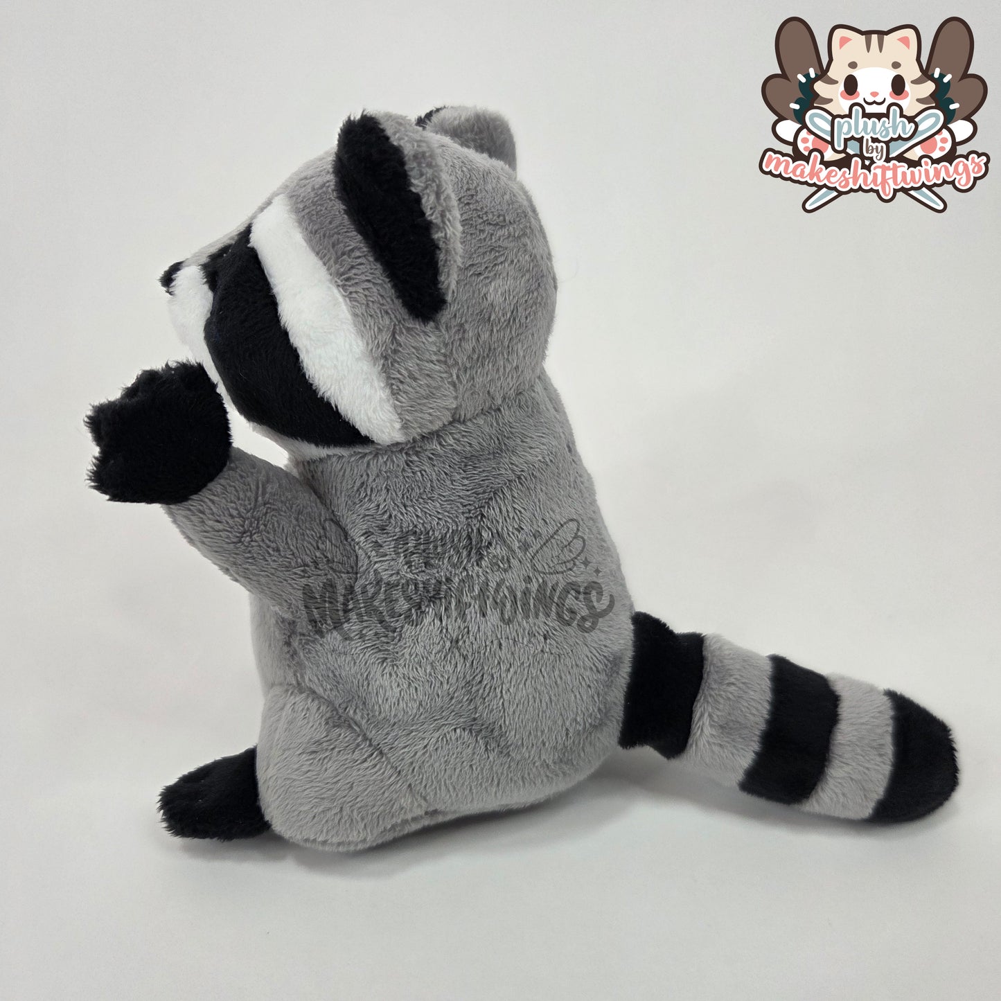 Raccoon in a chip bag (embroidered eyes)