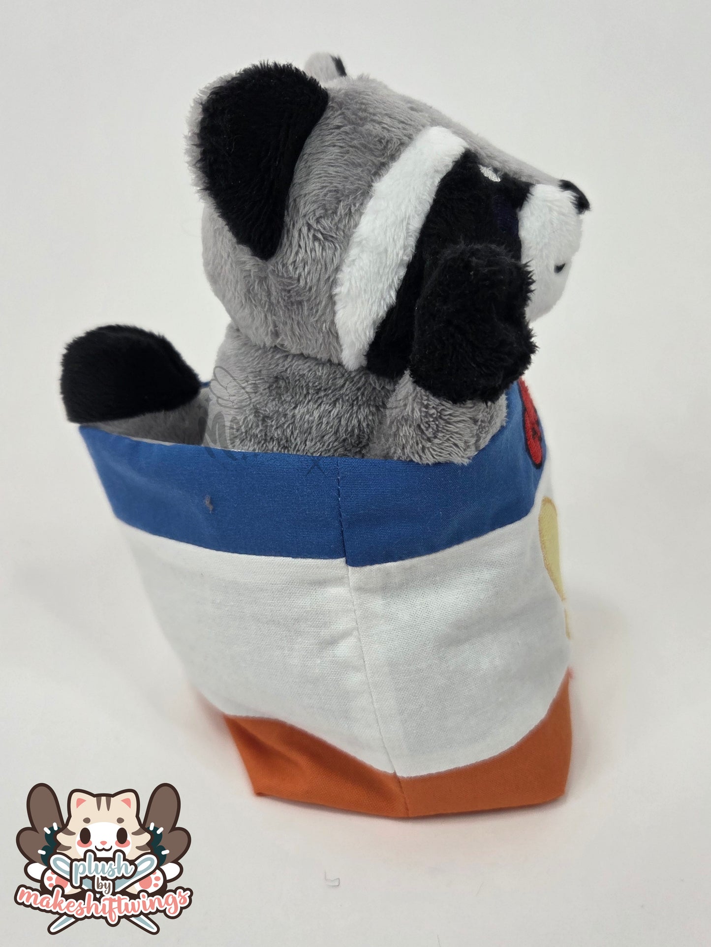 Raccoon in a chip bag (embroidered eyes)