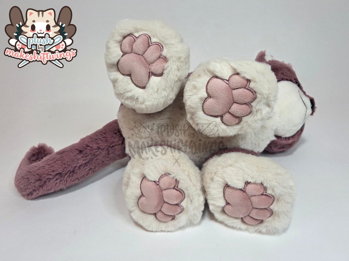 Floppy fluffy feline plush
