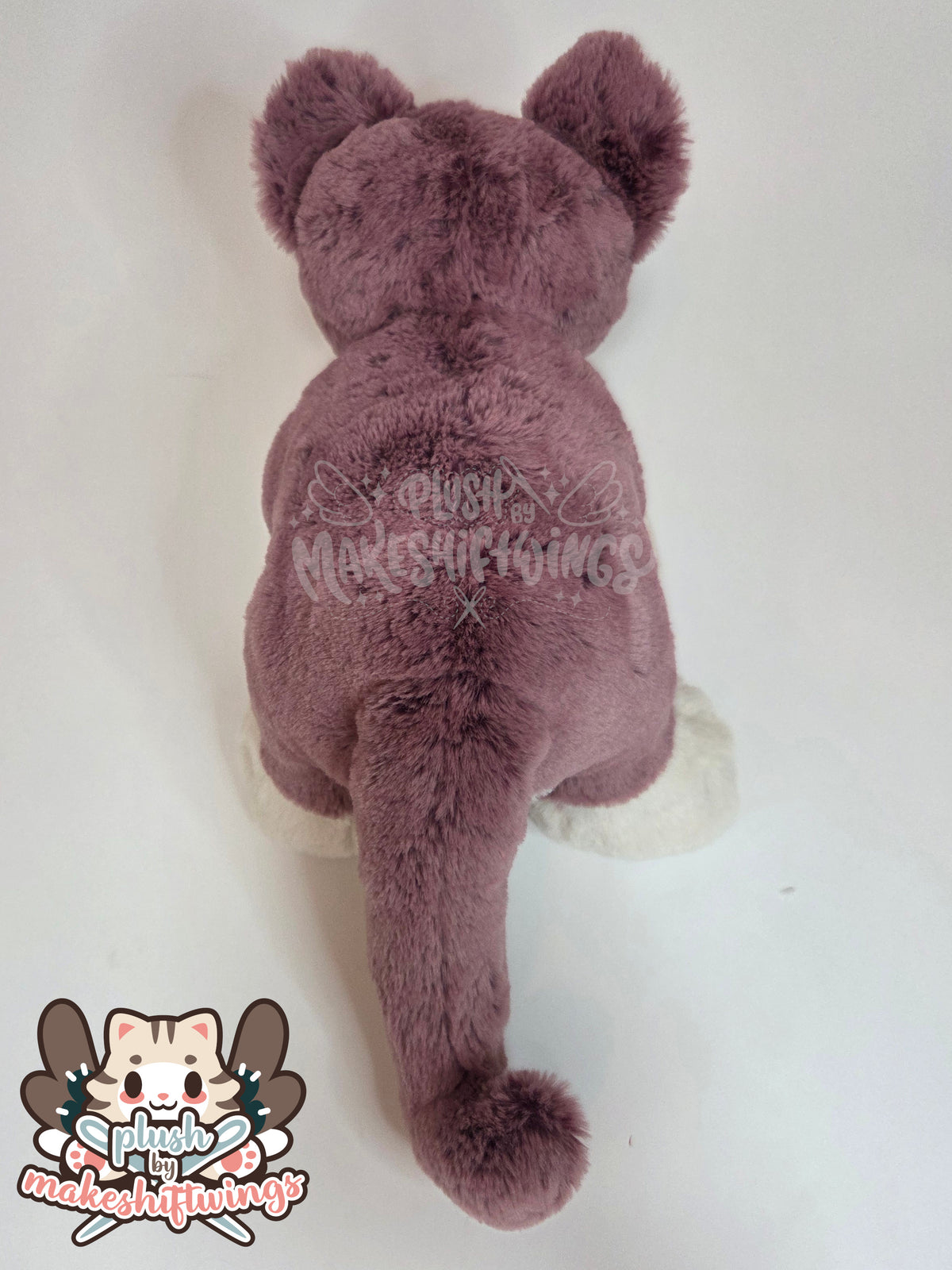 Floppy fluffy feline plush