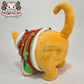 Orange fat cat in a sweater