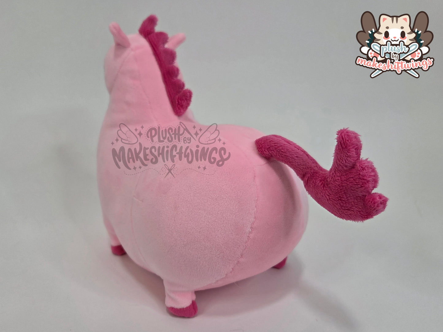 Pink party honse plush
