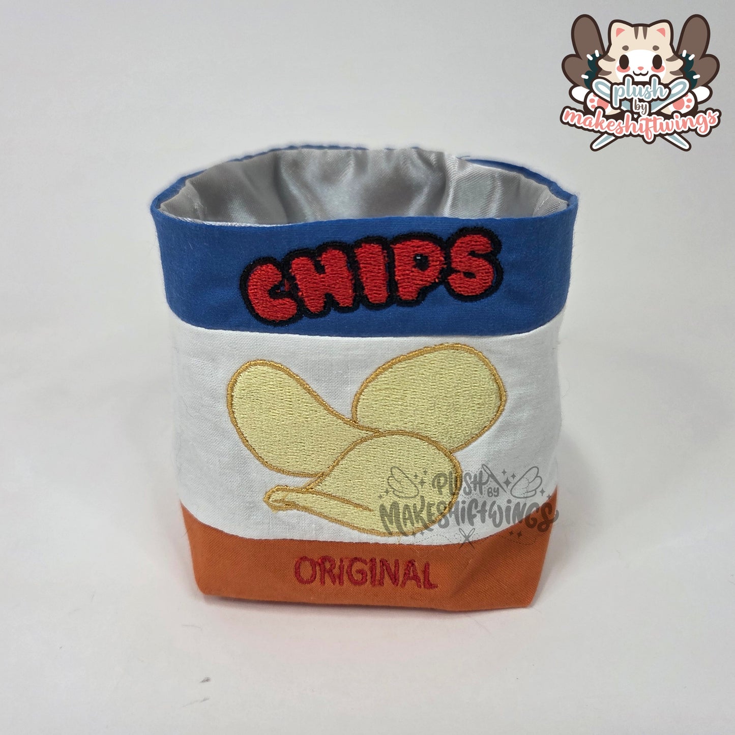 Raccoon in a chip bag (embroidered eyes)